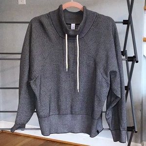 Varley striped raglan sleeve sweatshirt.